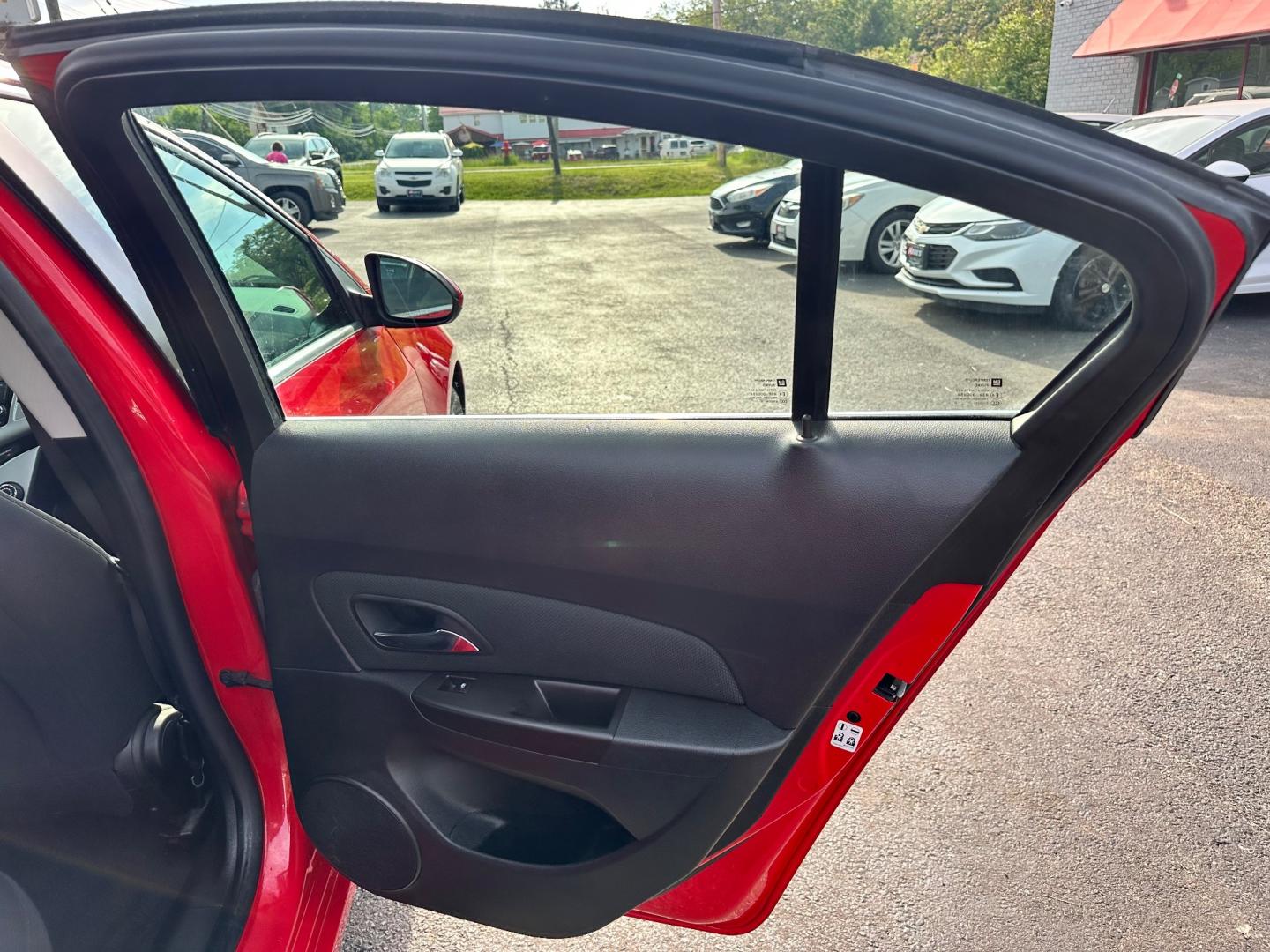 2016 Red /Black Chevrolet Cruze LT (1G1PE5SB9G7) with an 1.4L I4 DOHC 16V TURBO engine, 6-Speed Automatic transmission, located at 547 E. Main St., Orwell, OH, 44076, (440) 437-5893, 41.535435, -80.847855 - Photo#28